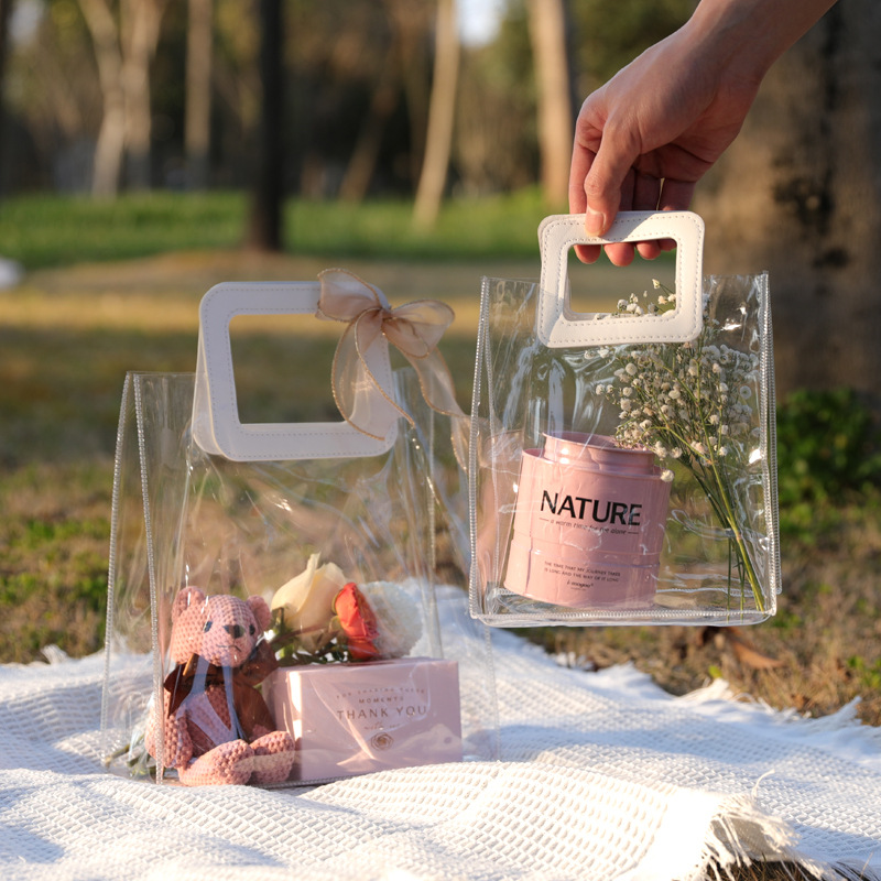 Navidad mano bolsa de regalo de la boda regreso dama de honor bebé luna llena caja de dulces de pvc transparente regalo de la mano