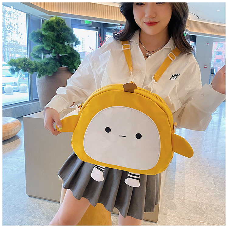 The new 2024 children's egg-shaped party backpack is a cute cartoon canvas single-shoulder bag and a fashionable and stylish small backpack undefined