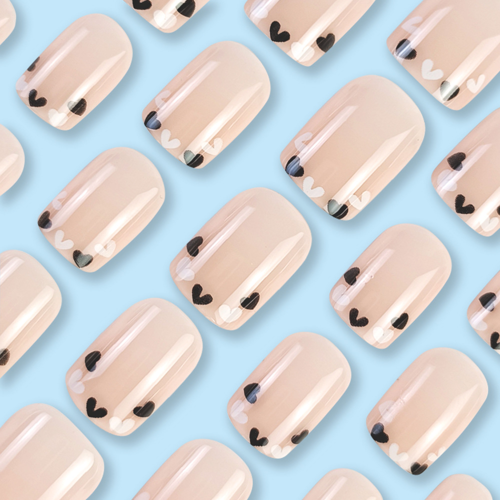 Ventas transfronterizas de polvo desnudo en blanco y negro, cuidado de uñas, dulce y simple, 24 piezas de uñas cortas falsas, parches de uñas falsas