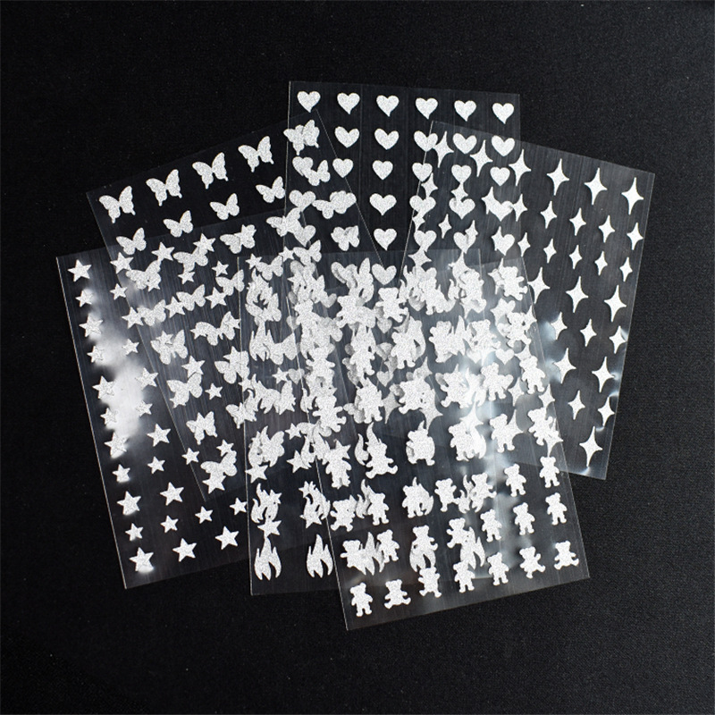 Nueva línea rojo plata brillante corazón estrellado uñas pegatinas mariposa oso llama estrella uñas pegatinas papel con adhesivo