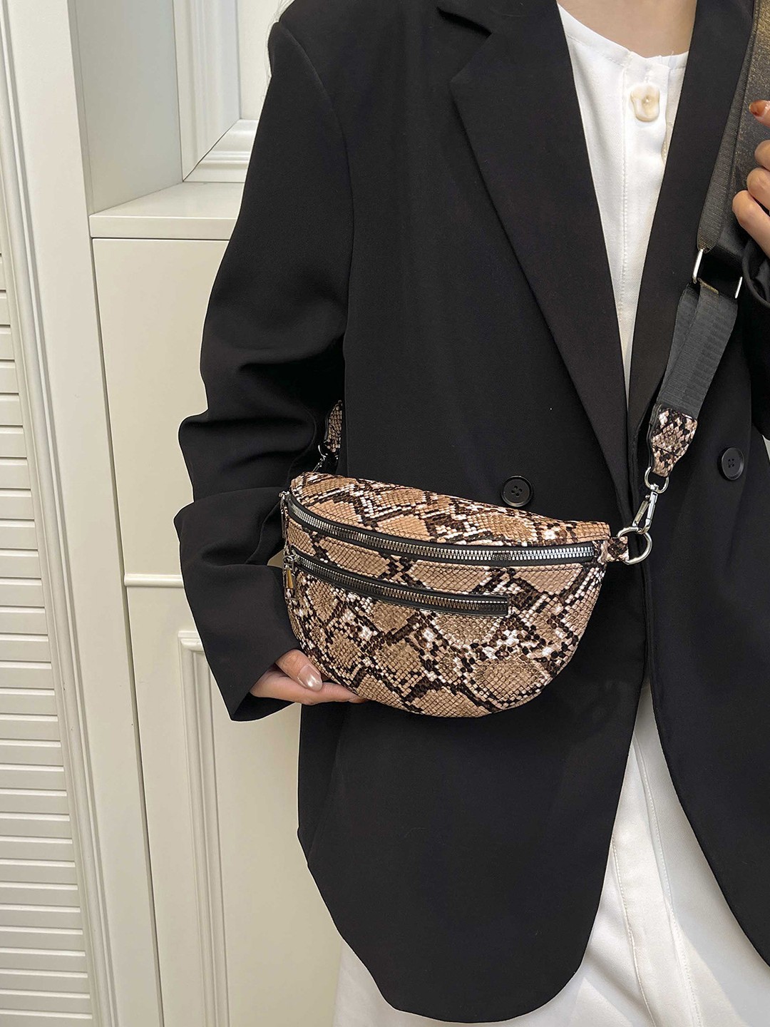 Bolso de cintura de piton para mujeres 2026 tendencia transfronteriza nueva moda europea y americana de moda ocio de viaje de hombro mochila