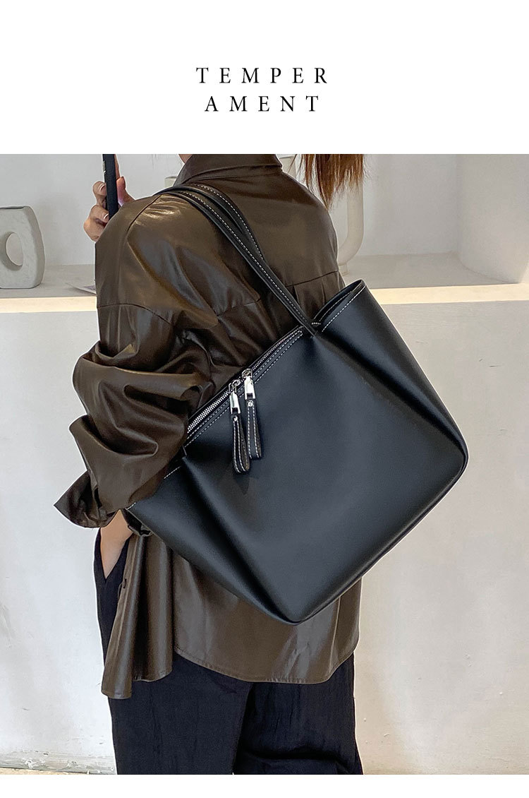 Femmes Grande Faux Cuir Couleur Unie Vêtement De Rue Fermeture Éclair Sac À Main display picture 1