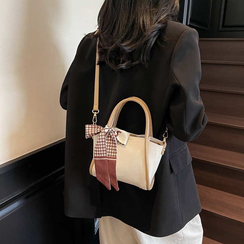 Nuevos productos transfronterizos más vendidos Bolso de cubo de mano para mujer 2025 Bolso de hombro popular salvaje Bolso femenino de canasta de verduras simple casual