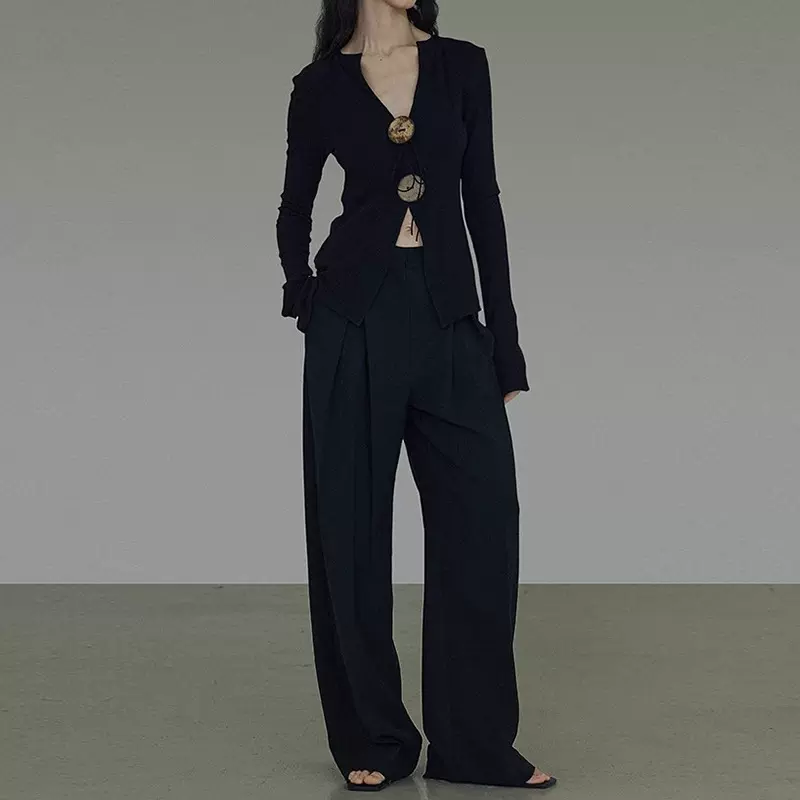 现货UNSPO设计感针织衫女V领显瘦复古气质长袖小众感春装上衣紧身