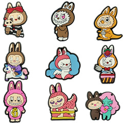 18個の新型かわいい布シリーズの穴靴の靴の花の靴のボタンの柔らかいゴムのサンダルの部品のアクセサリーのDIY靴の配合