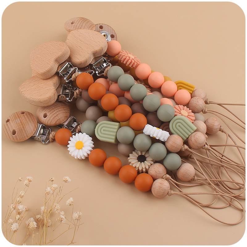 Nuevo bebé suministros de dibujos animados melocotón corazón Haya clip creativo DIY Daisy Arco Iris silicona pegamento mordedura cadena del pezón