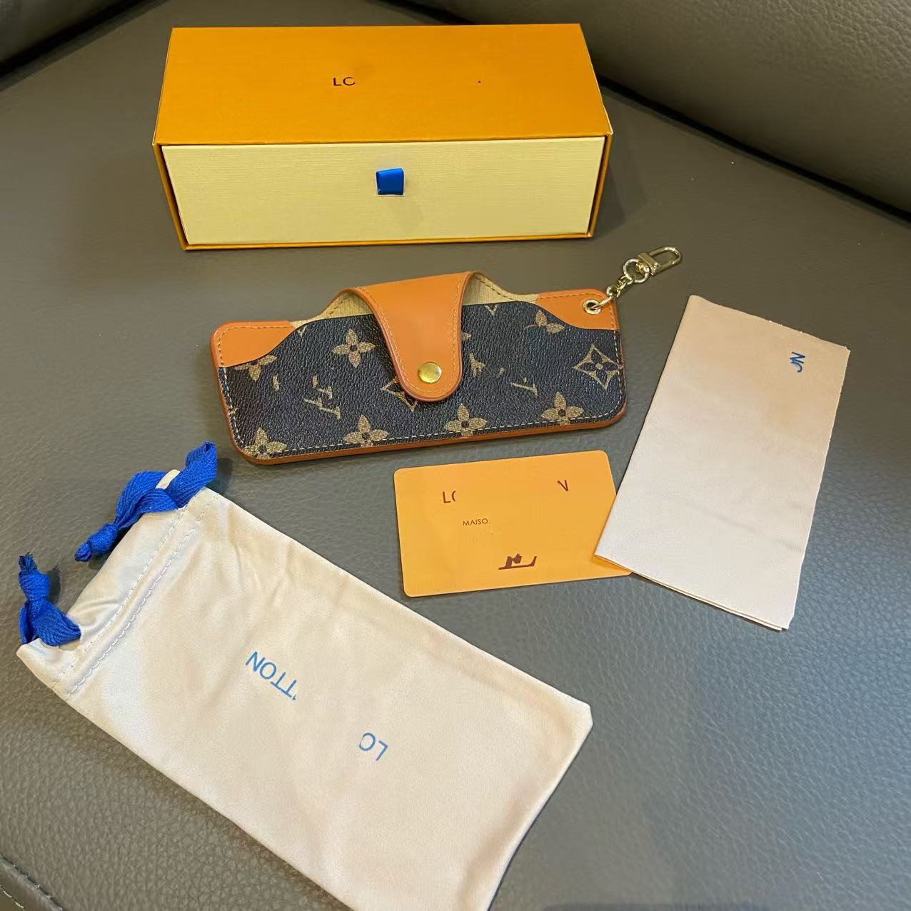 Mayorista de marca de alta calidad Xiaoxiang caja de gafas de sol conjunto completo de moda caja de embalaje de gafas de sol alta calidad