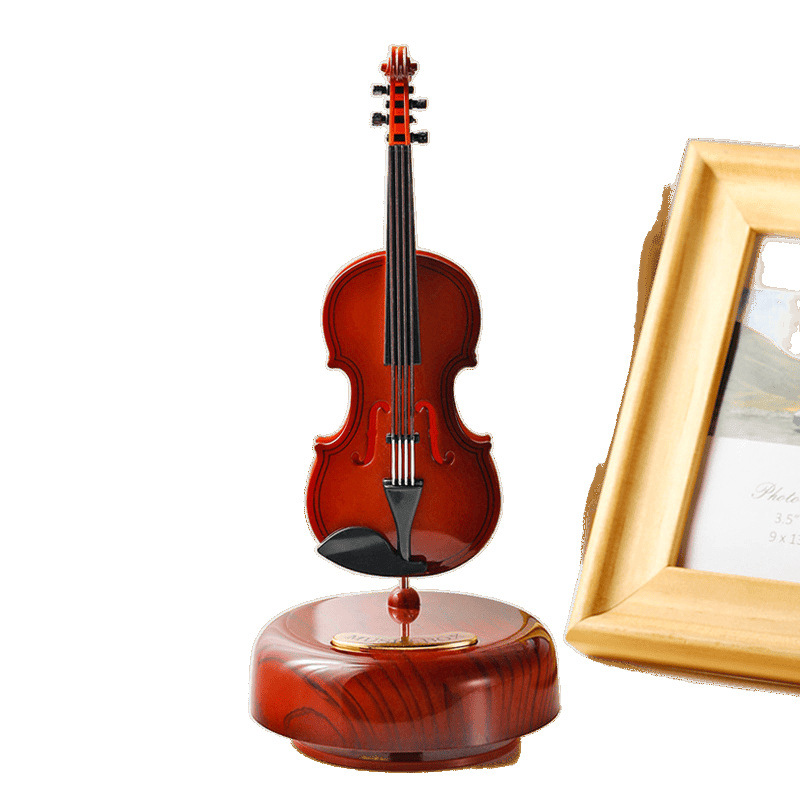 Classic rotating guitar, violin, table music box