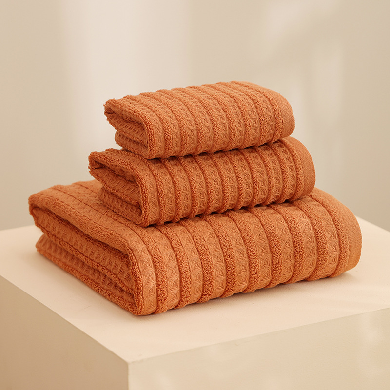 Toalla de algodón al por mayor toalla de baño que no es fácil de perder el cabello 2025 nuevo estilo liso, toalla de tira suave, toalla facial