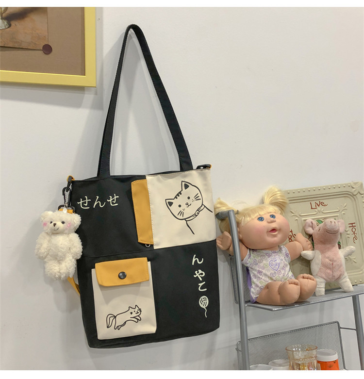 Wholesale Simple Hit Color Cat Pattern Messenger Tote Bag Nihaojewelry display picture 21