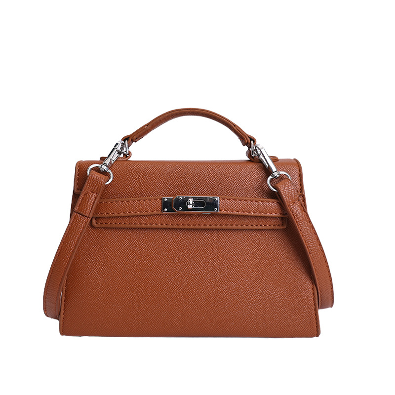 Botón de plata estampado de palma portátil Kelly bolso pequeño para mujeres 2026 ventas transfronterizas calientes nuevo lujo ligero de alta sensación mochila