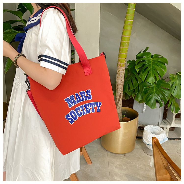 Canvas bag for women, single shoulder, ins crossbody, laid-back style, college student class bag, artistic Japanese style, large capacity, Hong Kong style, chic undefined