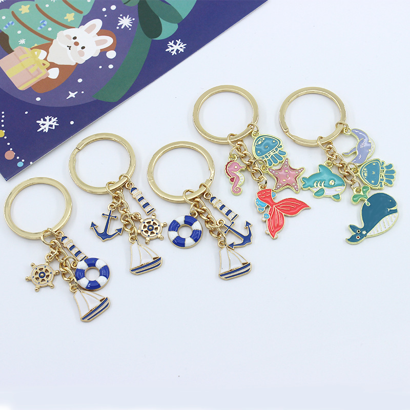 Cross-border hot sale keychain ship lighthouse lifebuoy rudder anchor sailing ship sea worker keychain pendant