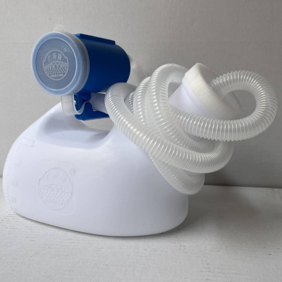 Embalaje separado con el tubo del hogar coche de gran capacidad urinario portátil extendida cama de plástico blanco auto-cuidado urinario