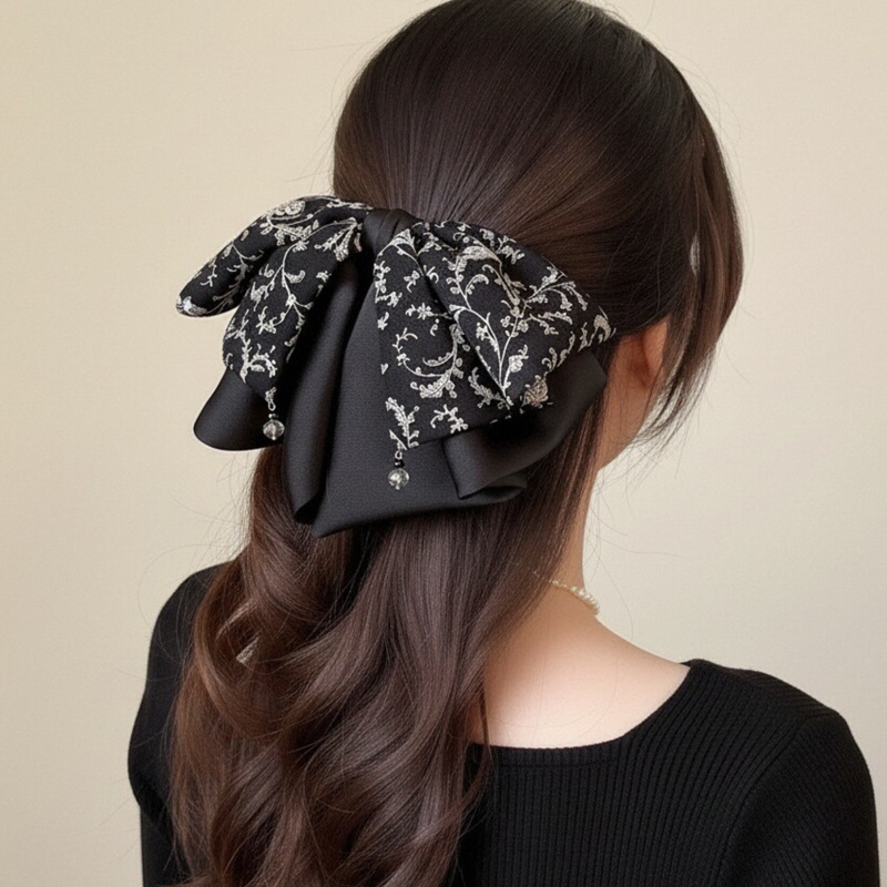 580 черная заколка для хвоста