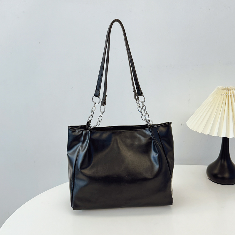 Alta sensación de bolso grande para mujeres 2024 nueva moda de verano de moda de gran capacidad de transporte bolsa bolsa de hombro de textura de mujer
