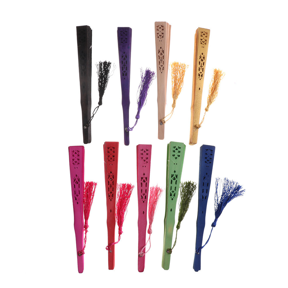 En stock colorido fragante ventilador de madera al por mayor mujer plegable bolsa de ventilador borla hueco tallado ventilador plegable ventilador de madera