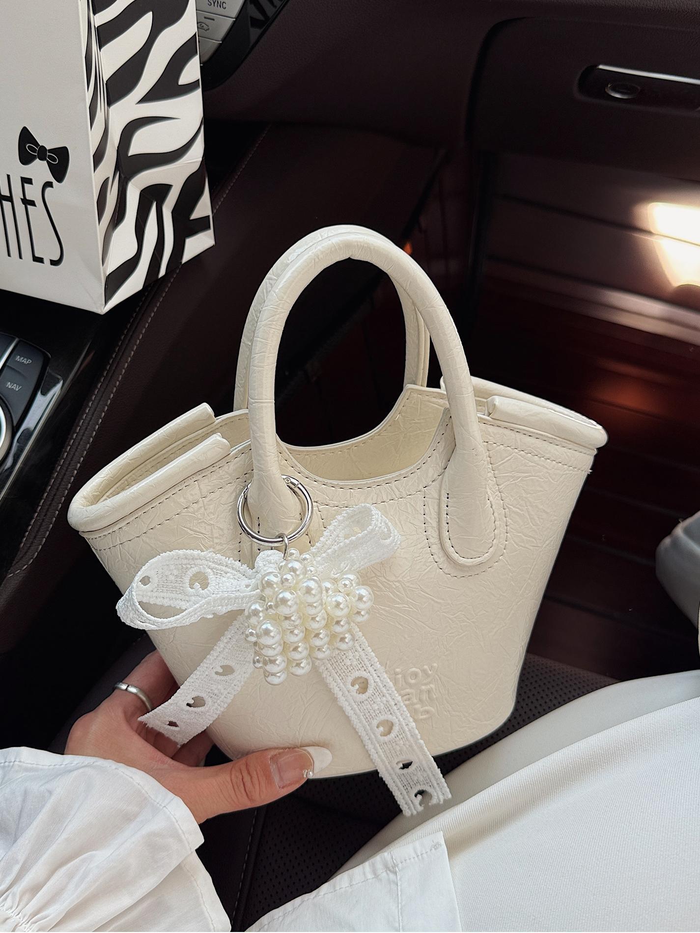 Bolso de cubo de mano de nicho de comercio exterior 2025 nuevo producto bolso de mensajero de moda casual de todo fósforo bolso de hombro de viaje de trabajo de moda