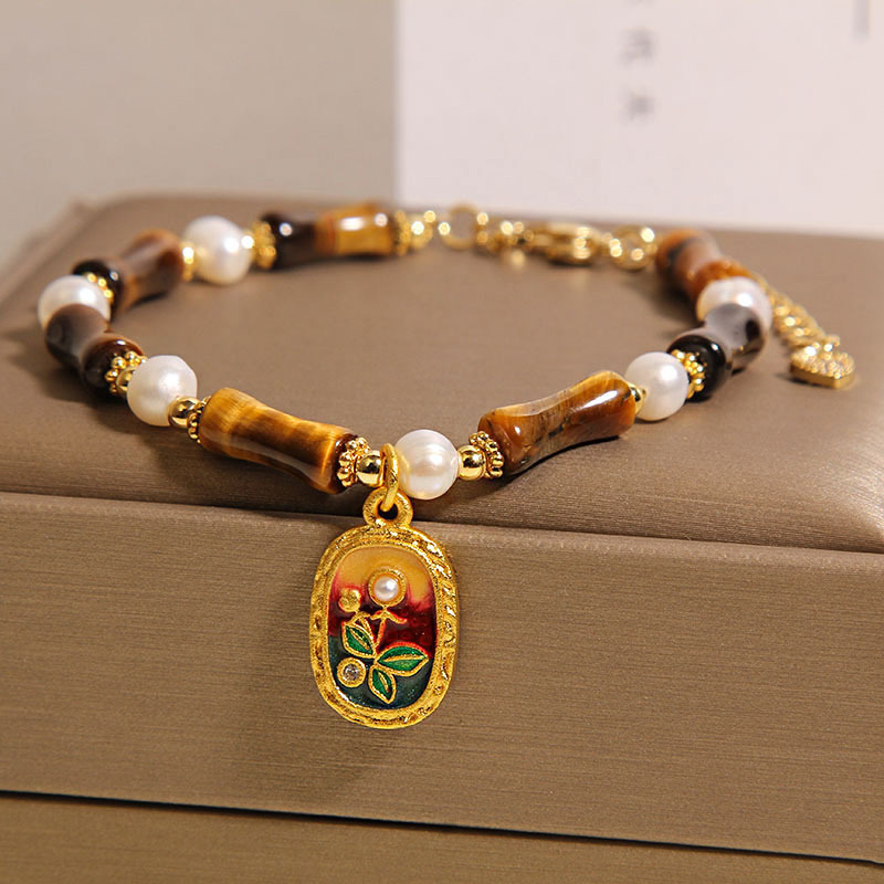 Nueva pulsera china de bambú de piedra de ojo de tigre, colgante de pintura al óleo de perlas de nicho de lujo ligero femenino, pulsera de estilo nacional, joyería de alta calidad