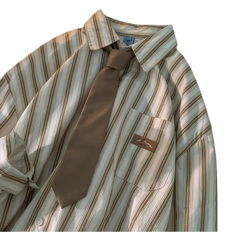 Camisa a rayas de manga larga para hombre primavera nueva camisa cityboy retro japonesa marca de moda de alta gama Pu guapo abrigo