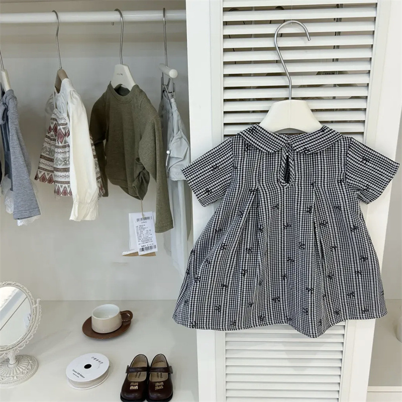 Niñas de verano nuevo vestido de estilo coreano para niños Mori muñeca cuello de arco impresa cuadrada vestido de princesa de manga corta