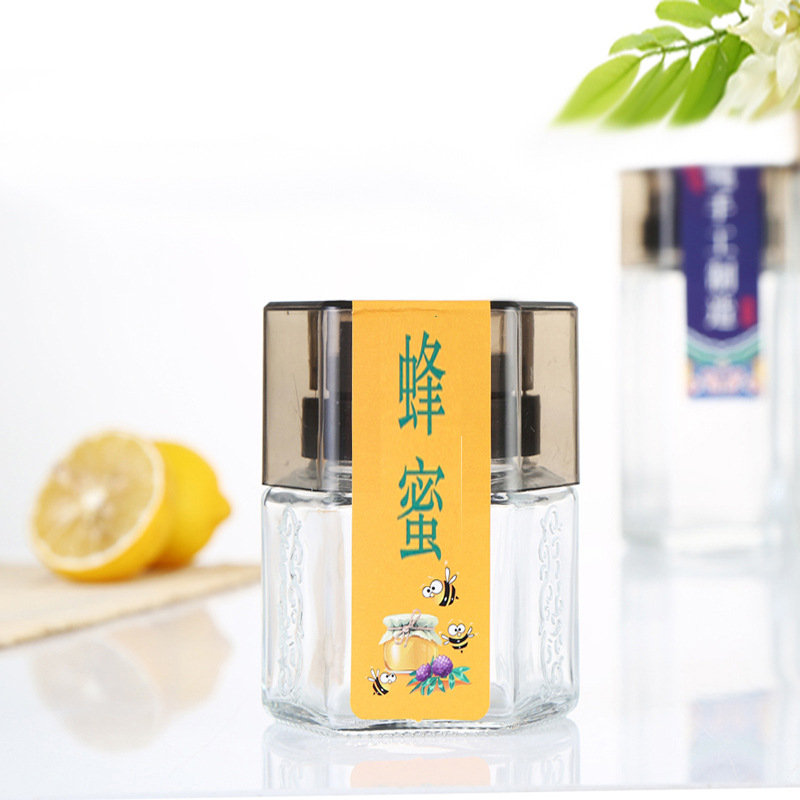 Honey-specific glass bottle, 1 jin (500g) capacity, with a pointed spout for easy pouring, thickened sealing storage jar, packaging bottle, empty honey container.