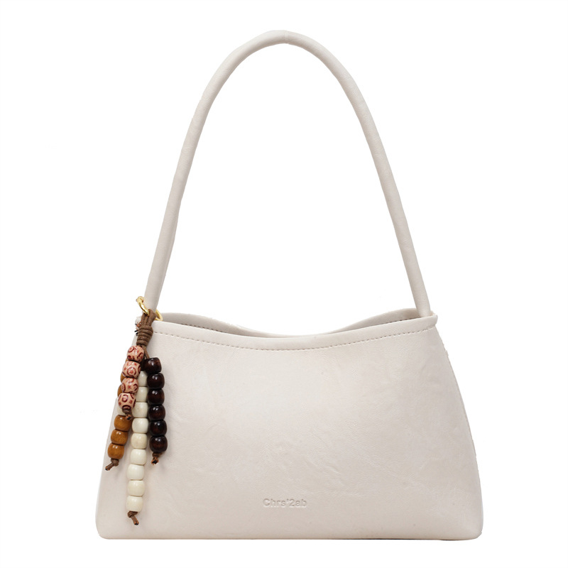 Bolsas transfronterizas para mujeres 2025, otoño y invierno, nuevo bolso coreano, bolso de brazo retro, bolso de hombro simple de moda para mujeres.