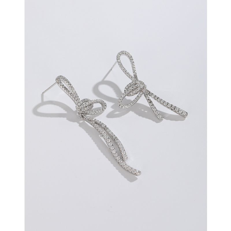 925 plata esterlina completo diamante arco borla pendientes femeninos de alto grado pendientes de nicho diseño asimétrico largo pendientes