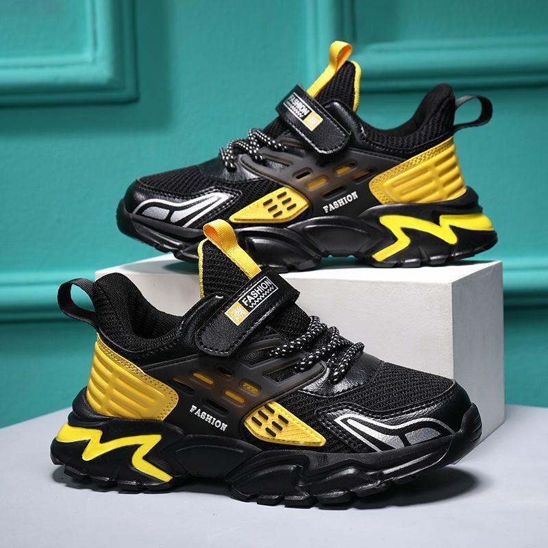 Zapatos de los muchachos al por mayor Zapatillas de deporte para niños malla transpirable primavera y otoño cuero nuevo estudiante Medio y grandes niños campus zapatos