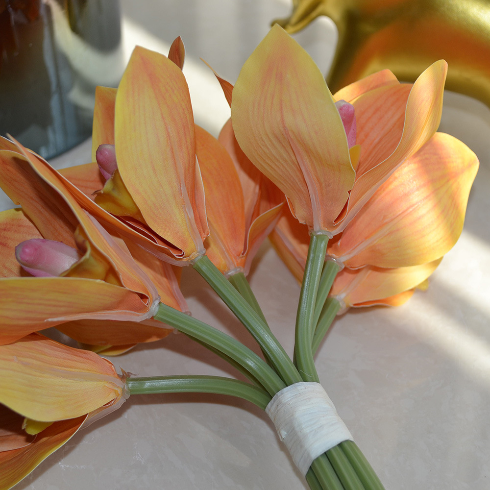 cymbidiums with bunches and flowers in hand, home model room decoration, dining table and coffee table decorations, fake flowers_voghion.com
