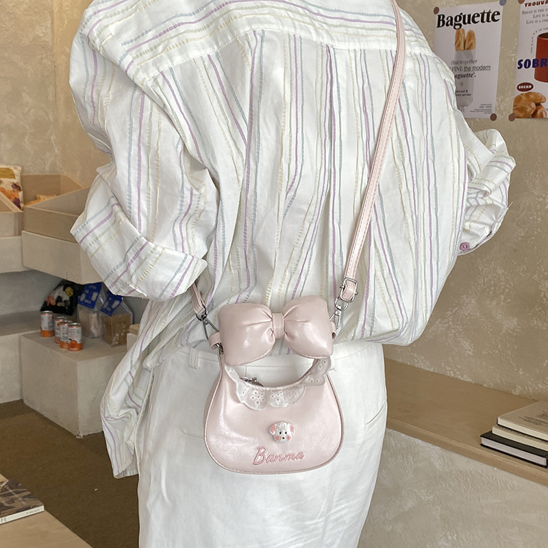 Bolsa de hombro de niñas de encaje dulce bolso de arco lindo 2026 nuevo mini bolso de accesorios para niños