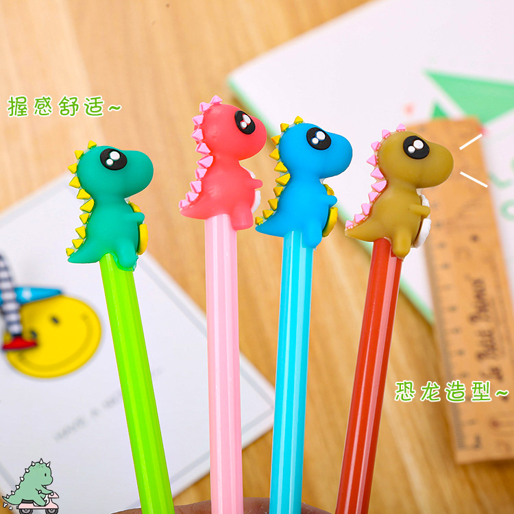 Papelería creativa dinosaurio cabeza de silicona pluma de gel de dibujos animados lindo aprendizaje Oficina a base de agua firma pluma ventas directas de la fábrica