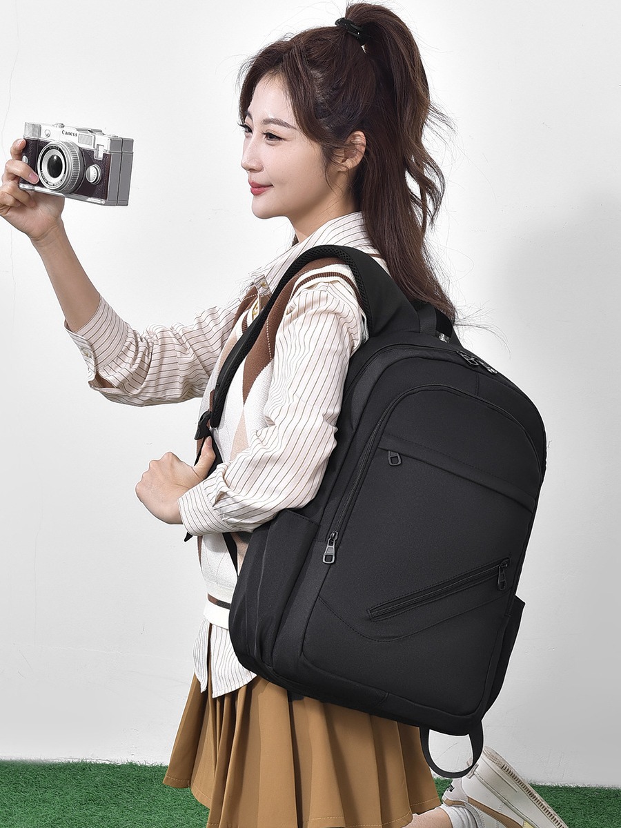 Mayorista nueva mochila de negocios de comercio exterior para hombres y mujeres nueva mochila de computadora de viaje simple bolsa de gran capacidad