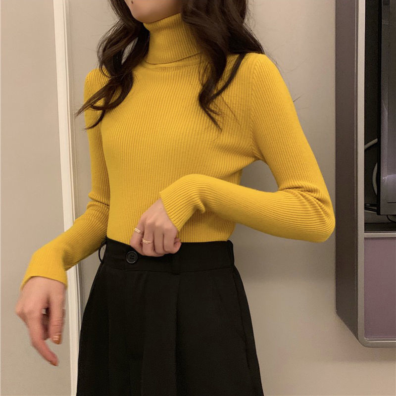 高襟のニットの底のシャツの女性の長袖の秋冬の新型の百合のセーターの女性は学生を厚くして身を修めて上着を掛けます。|undefined