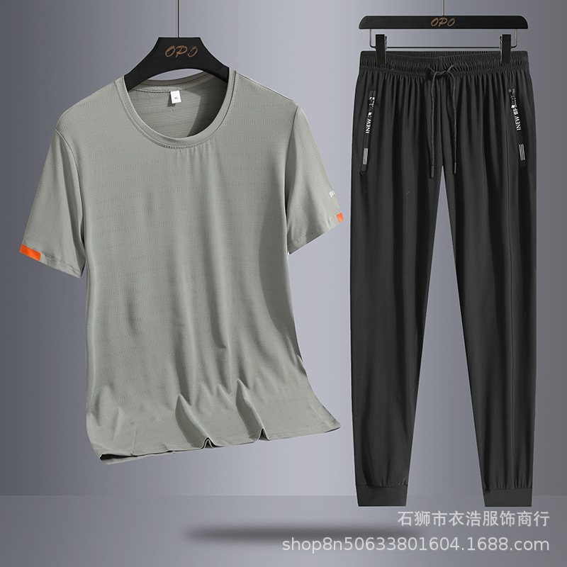 Conjunto casual de verano para hombre, de seda helada, de marca moderna, holgado, talla grande, de secado rápido, camiseta deportiva de dos piezas con pantalones largos.