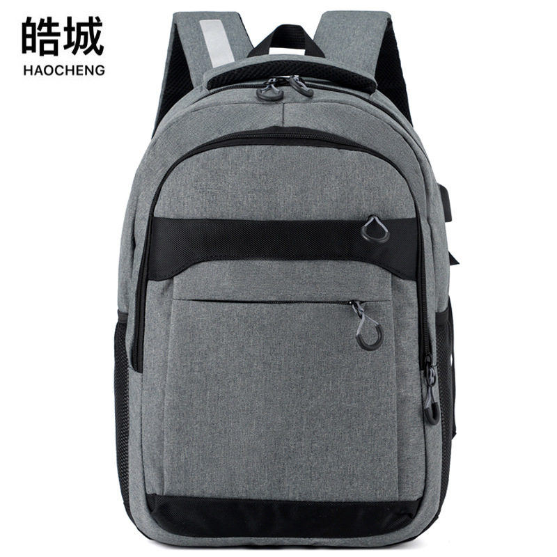 Mochila de computadora de hombre de carga USB de viaje de negocios de gran capacidad Mochila de estudiante de secundaria Mochila de viaje de ocio