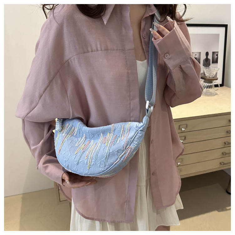 The new 2024 fashionable canvas versatile dumpling bag, a simple and stylish single-shoulder bag for commuting ladies with a high level of appearance undefined
