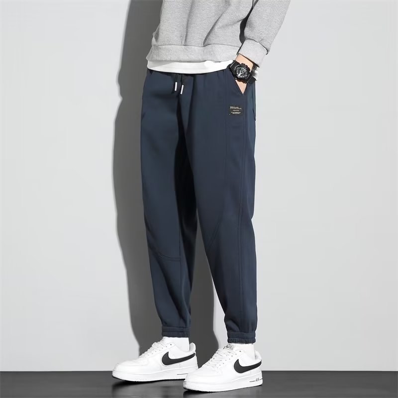 Camisa menos ropa pantalones de chándal para niños Otoño e Invierno Nuevos pantalones casuales engrosados forrados de lana pantalones ajustados de moda Pantalones deportivos sueltos