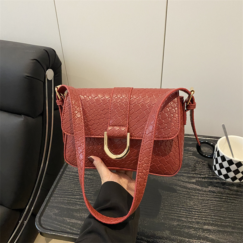 Bolsa de brazo de mujer trenzada retro 2025 primavera nueva bolsa de brazo en el temperamento bolso pequeño bolso cuadrado bolso mujer
