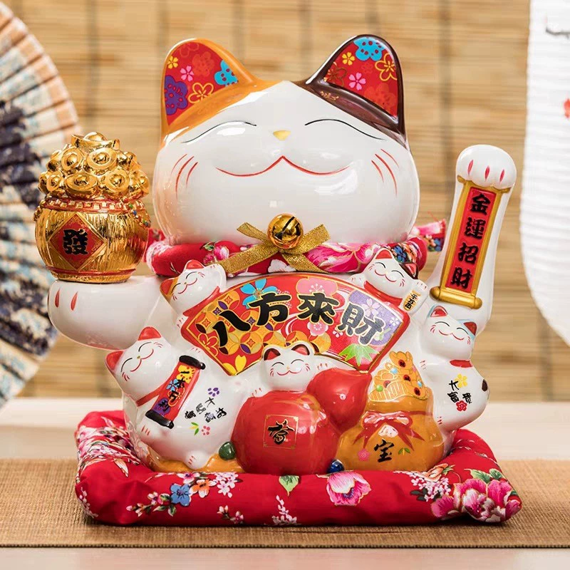 7 -inch wealth cat ornament shakes hands.