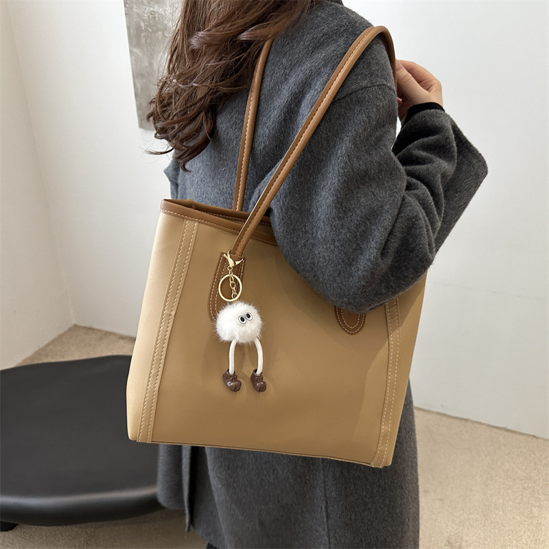 Bolsa axillar de gran capacidad para mujeres 2024 nueva moda otoño invierno sensación de bolso de hombro para estudiantes casuales bolso de clase