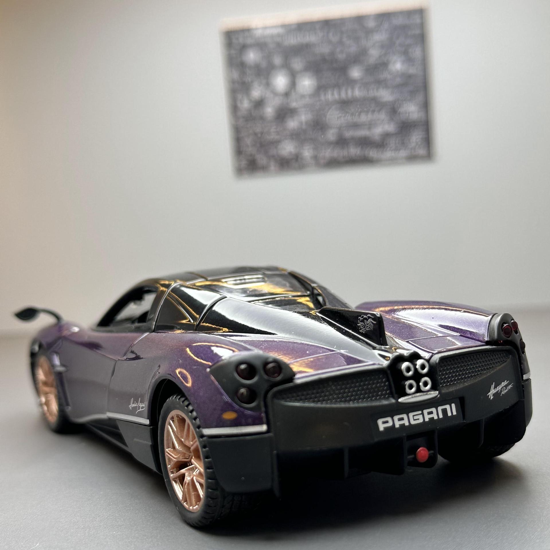 Modelo de coche de aleación Jiaye 1:32 Pa coche deportivo de barro dragón chino Huayra sonido y luz Tire hacia atrás herramienta modelo de coche adornos