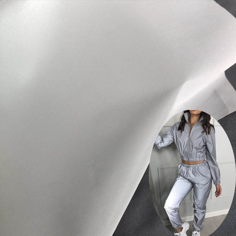 耐水洗普亮涤纶反光布 柔软休闲运动服反光面料 银白色反光化纤布