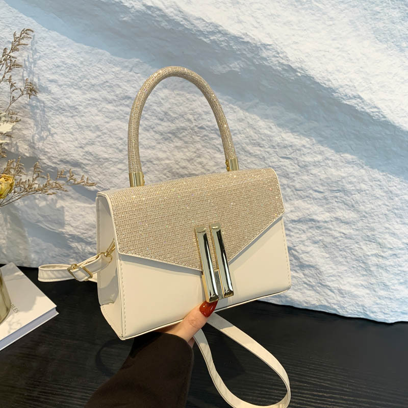 Temperamento coreano de mujer de viaje ins textura color contrastante empalme bolso casual2024 textura retro mochila de hombro