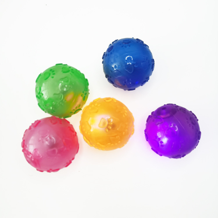 Mascota juguete huellas de bola huellas luminosa bola elástica perro interactivo resistente a la mordedura molar TPR diente limpieza juguete ventas directas de la fábrica