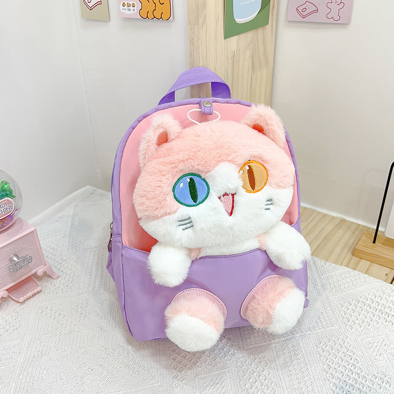 Nueva mochila de dibujos animados para niños tendencia pupila diferente gato muñeca mochila desmontable jardín de infantes en stock