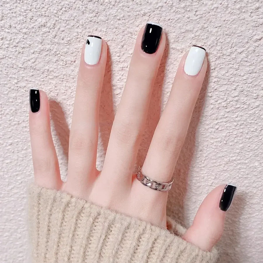 Esmalte de uñas pegamento blanco y negro 2023 pegamento de fototerapia transfronteriza de larga duración esmalte de uñas salón de uñas lote de fábrica especial