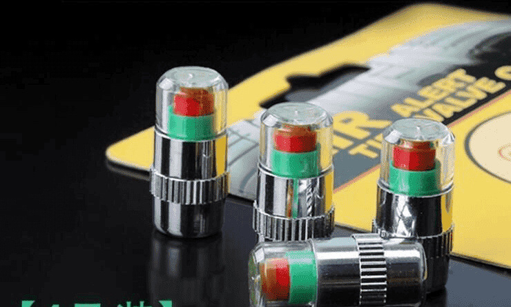 Tire pressure monitoring valve core with three-color warning for tire pressure monitoring
