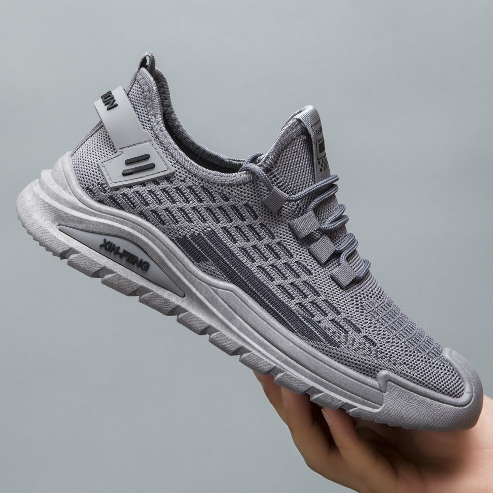 Zapatos de malla para hombre otoño nuevo estilo de moda zapatos casuales zapatos casuales al aire libre para jóvenes zapatos deportivos tejidos voladores al por mayor