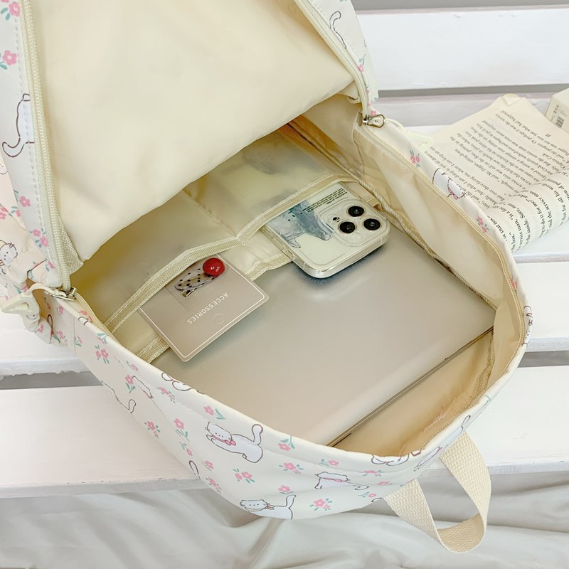 2025 nueva mochila caricatura encantadora impresión mochila de estudiantes de primaria y secundaria mochila de viaje ligera de gran capacidad